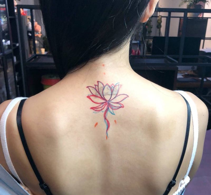 荷花遮盖纹身图片