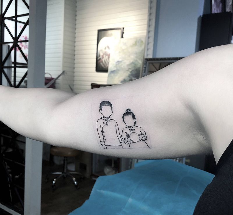 照片简画纹身图片_手臂纹身图案