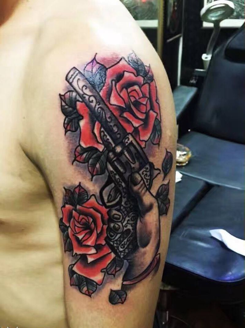 枪与玫瑰纹身图片