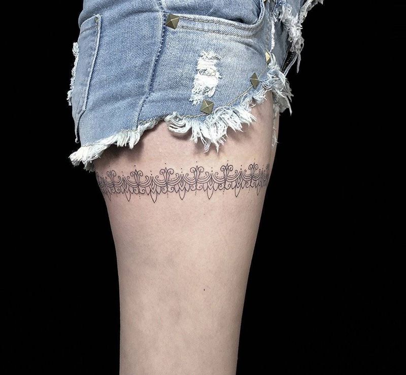 蕾丝纹身图片_腿部纹身图案
