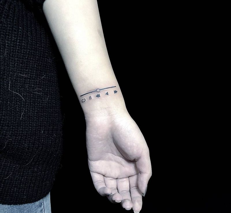 进度条遮盖纹身图片_手臂纹身图案