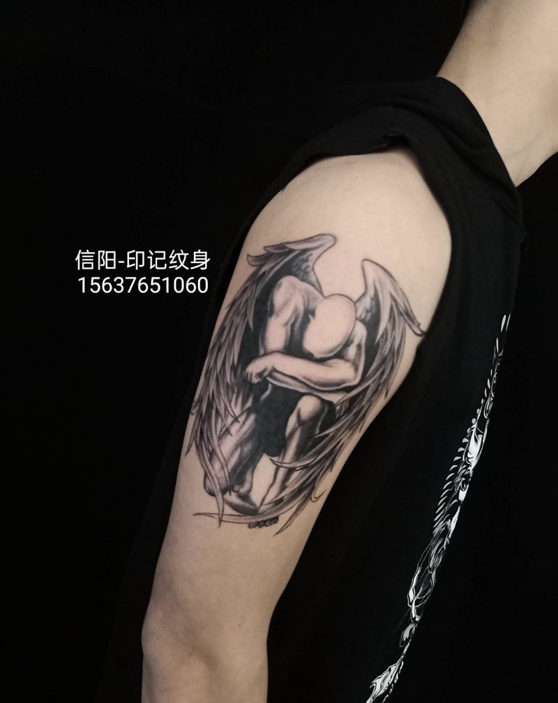 大臂纹身纹身图片_手臂纹身图案