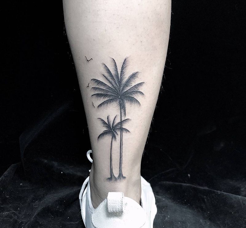 椰子树纹身图片_腿部纹身图案