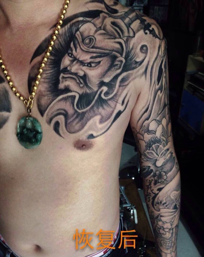 半甲花臂纹身图片