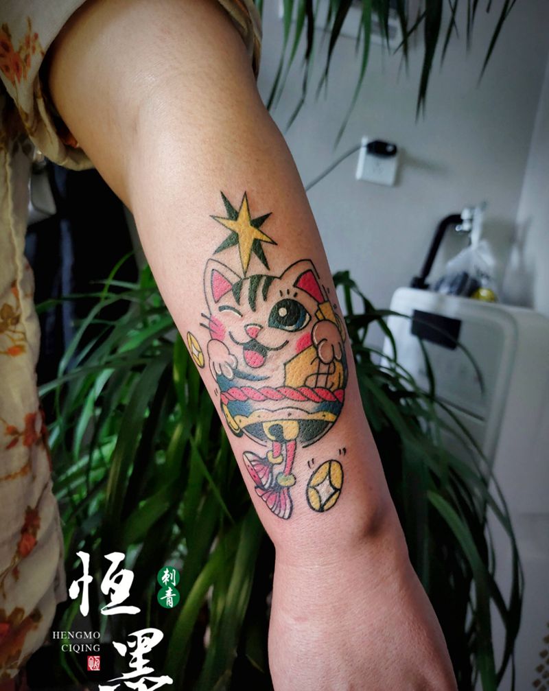猫咪达摩蛋纹身图片_手臂Old School纹身图案