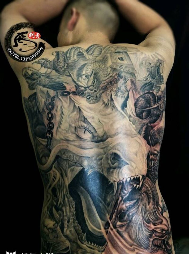 九龙拉棺纹身图片