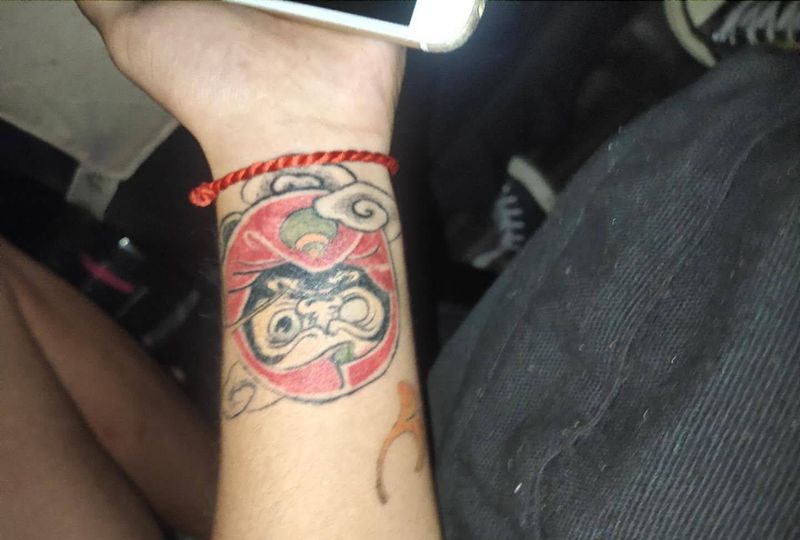 修改一个小达摩纹身图片_手臂纹身图案