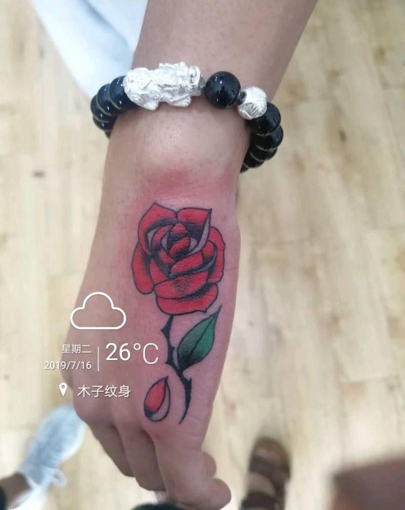 玫瑰遮盖纹身图片_手部纹身图案