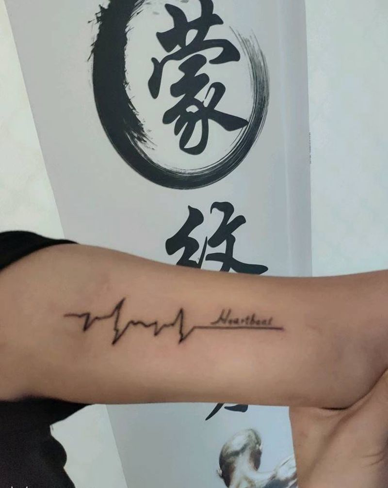 心跳纹身图片_手臂点刺几何纹身图案