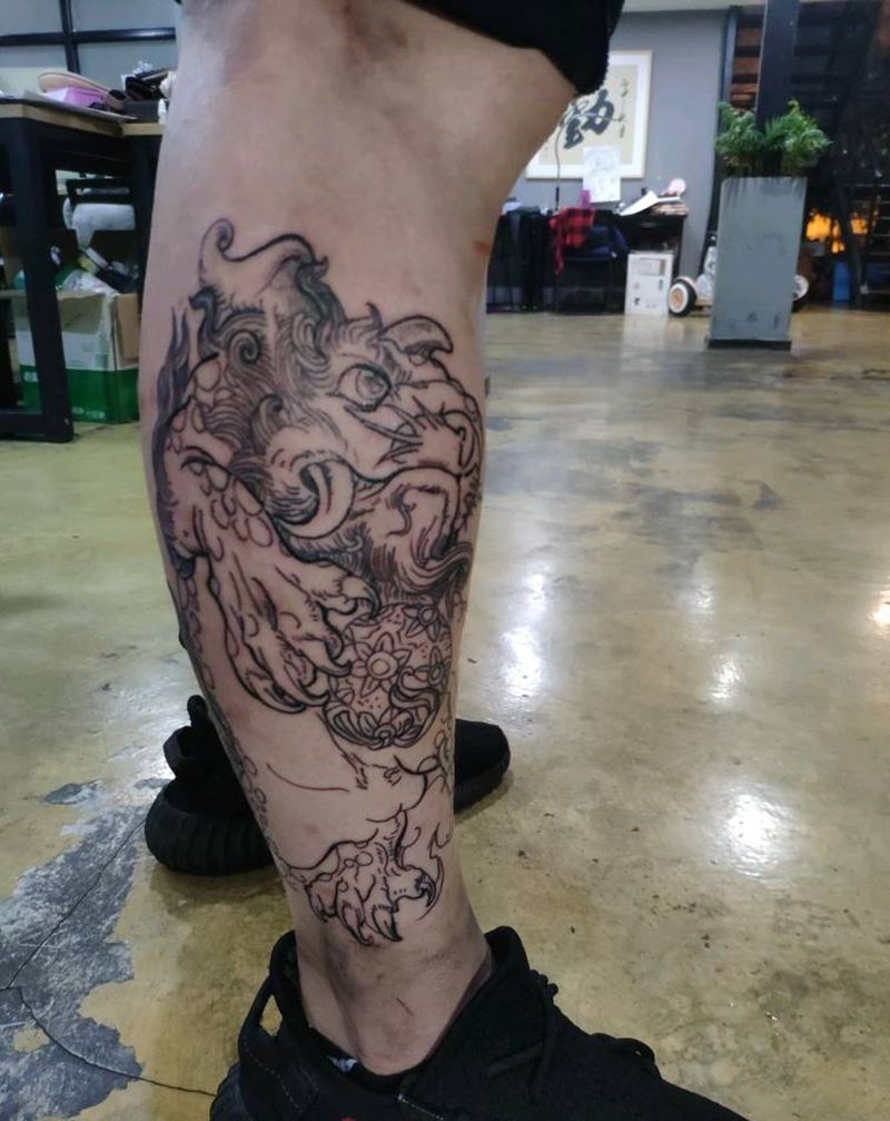 唐狮线条纹身图片_腿部纹身图案