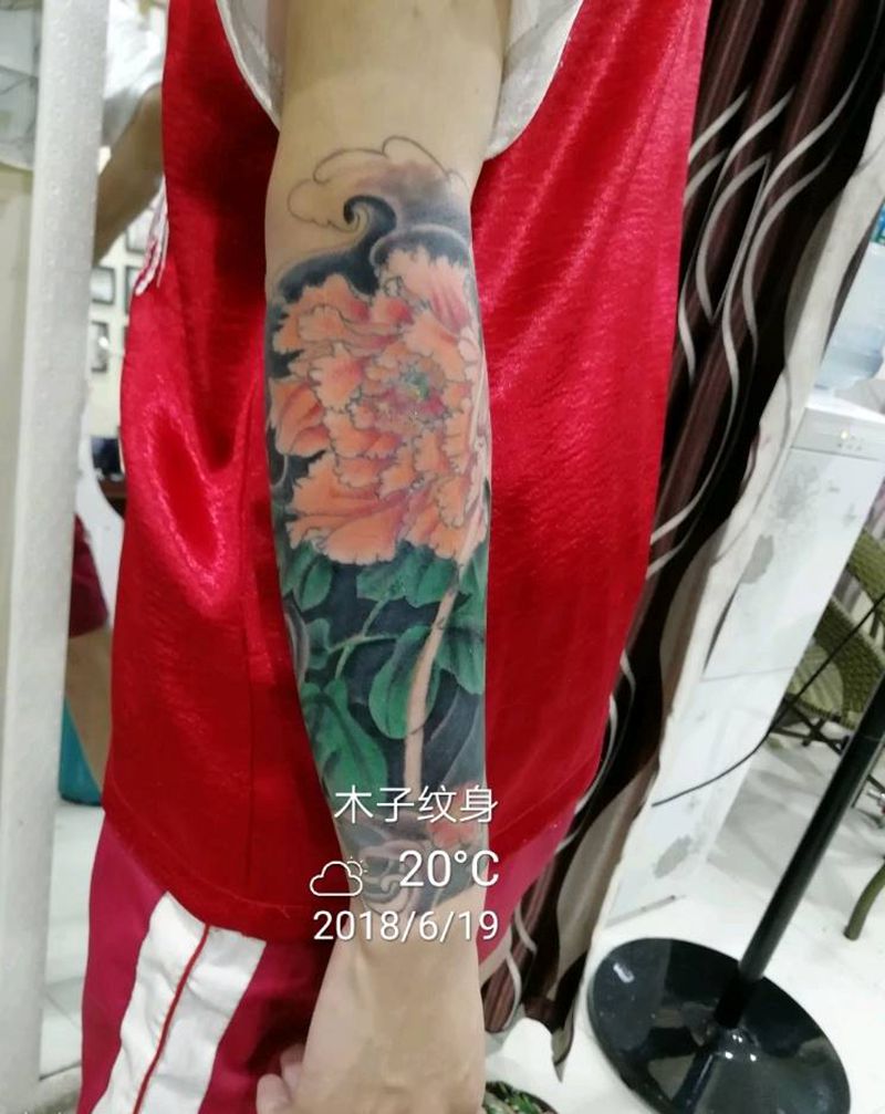 小花臂纹身图片