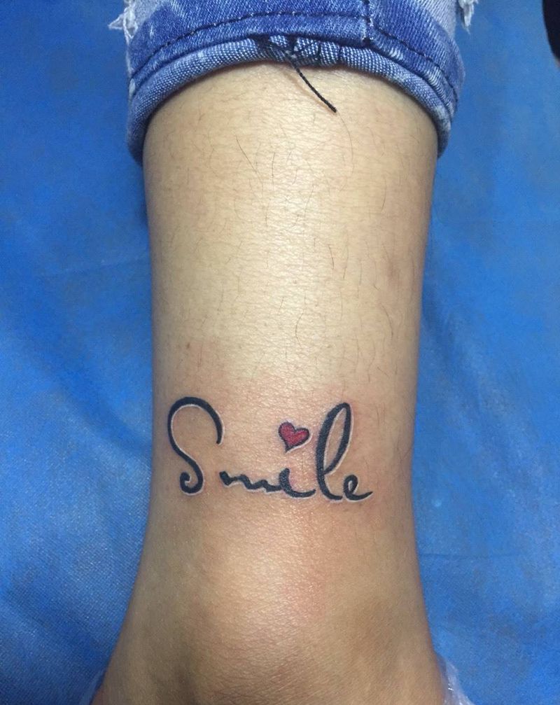 微笑纹身图片_成品脚部腿部清新贴纸字符纹身图案