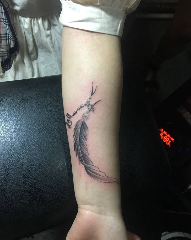 羽毛遮盖老图纹身图片