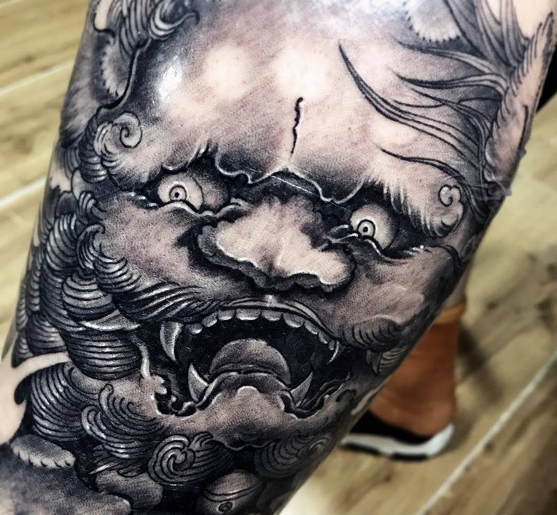 唐狮子纹身图片_成品腿部传统写实动物纹身图案