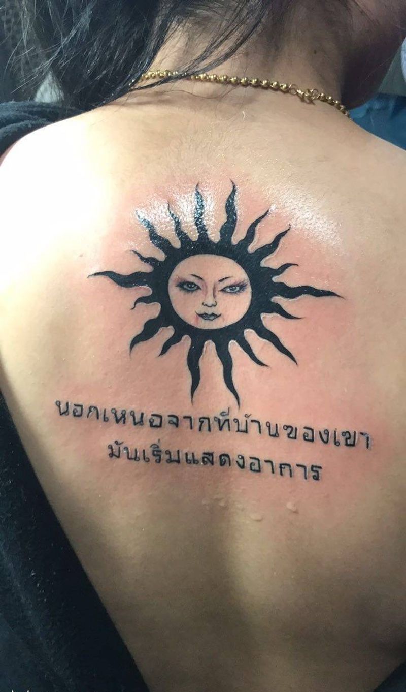 太阳标志纹身图片