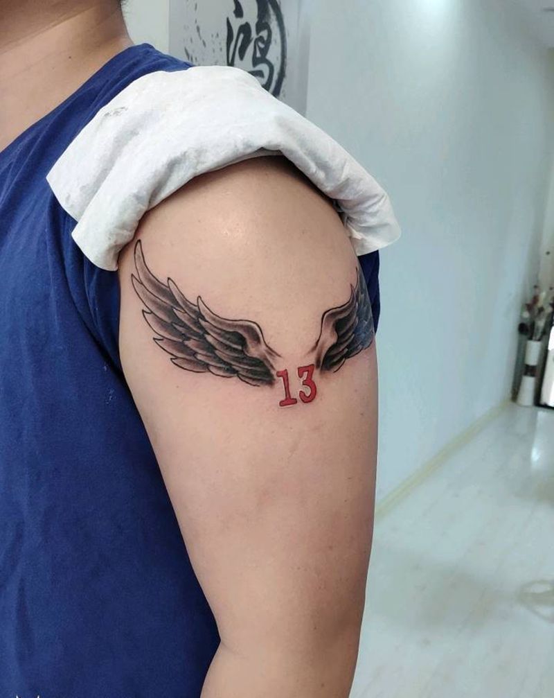 翅膀纹身图片_手臂新传统纹身图案