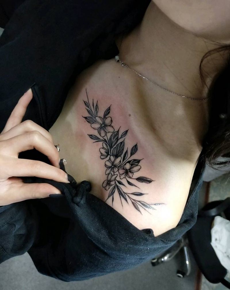 养鱼的锁骨纹身图片_胸部点刺纹身图案