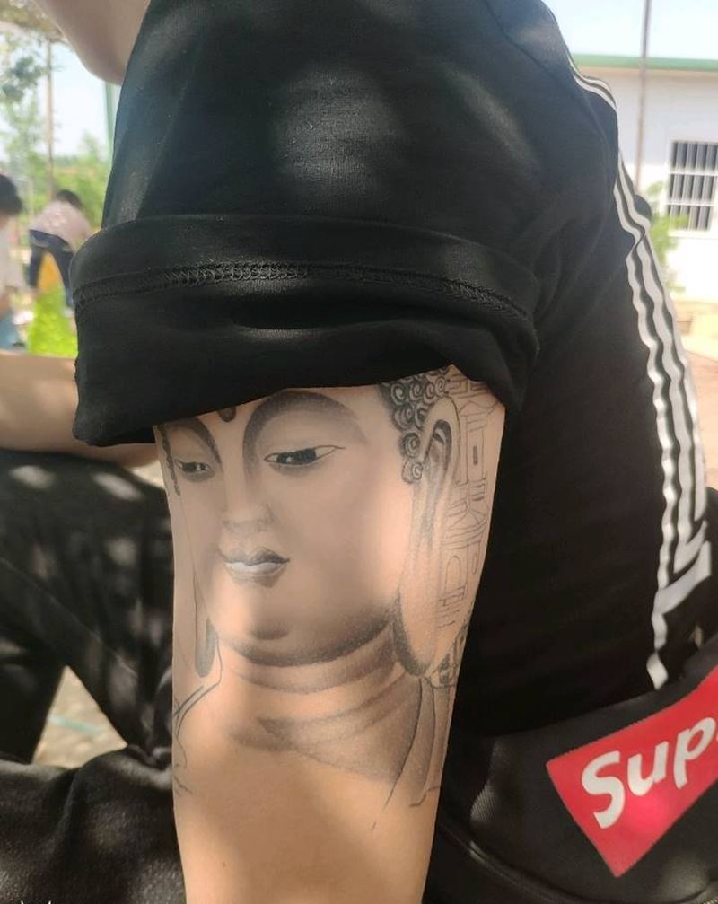 佛纹身图片_手臂新传统纹身图案