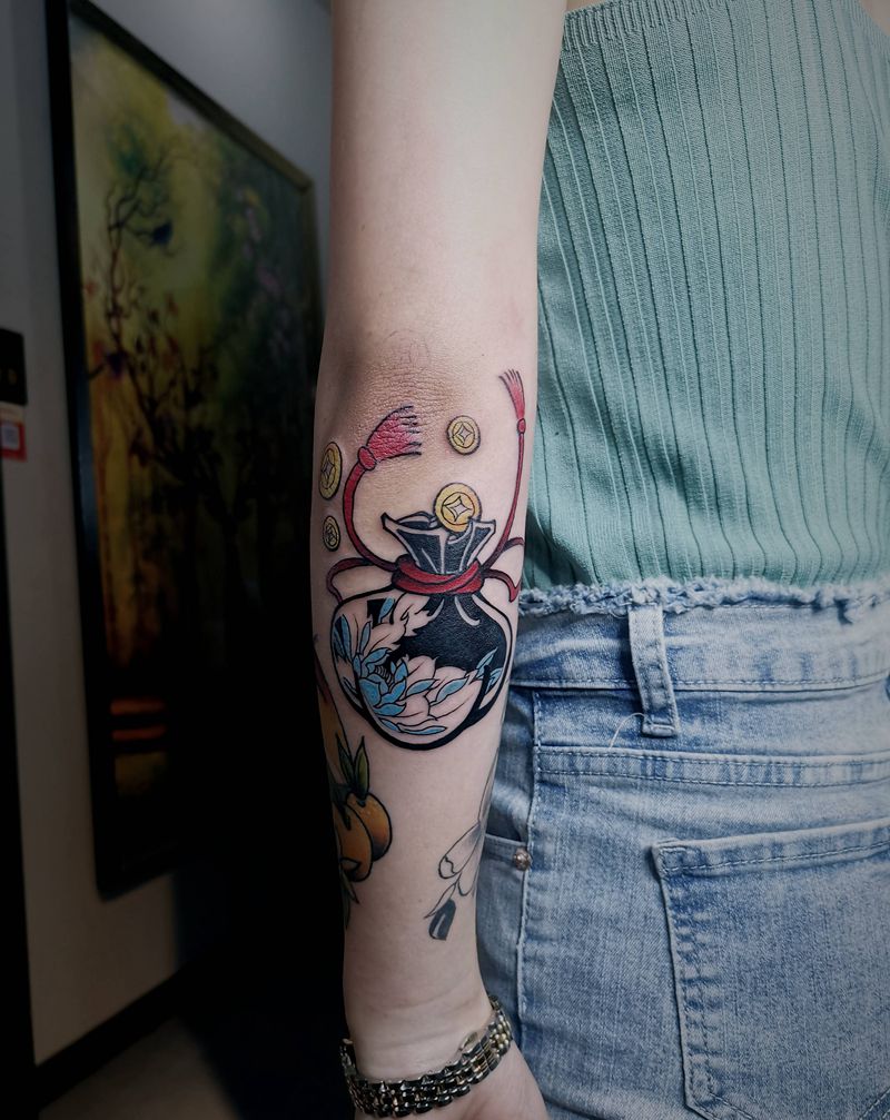 钱袋纹身图片_手臂Old School纹身图案