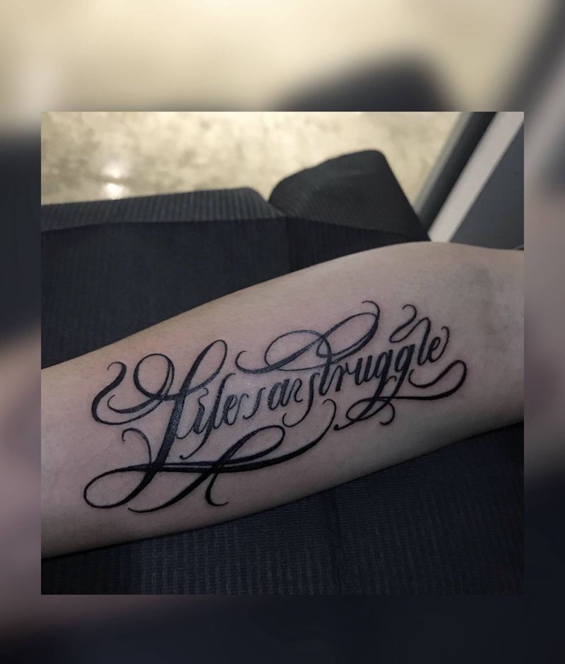 UVB2纹身图片_手臂花体字纹身图案