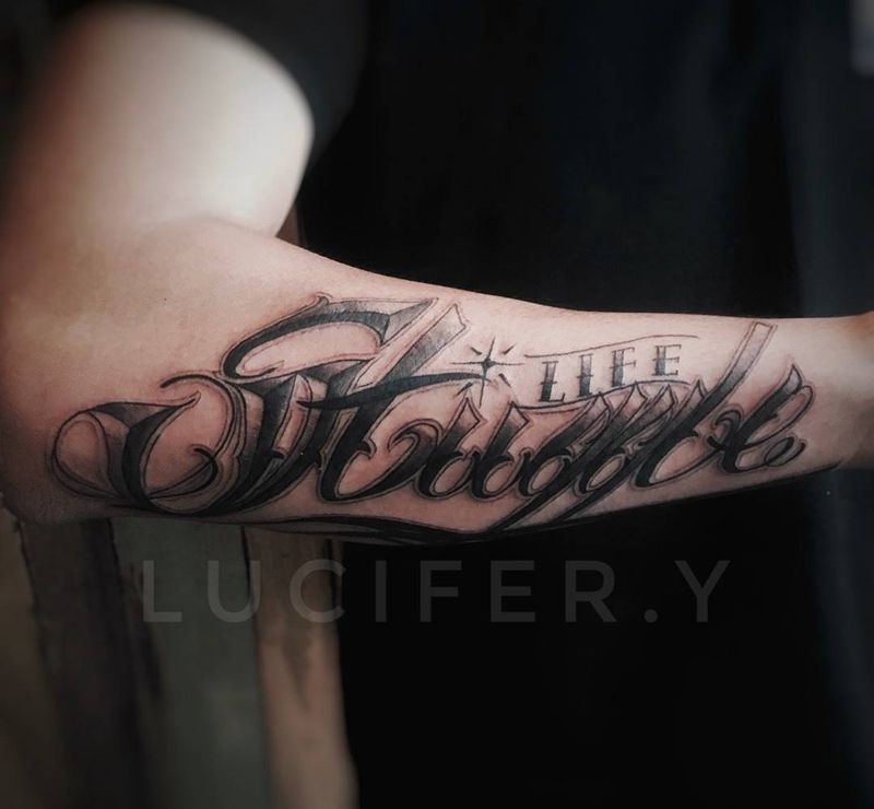 life stuggle纹身图片_成品手臂欧美字符纹身图案