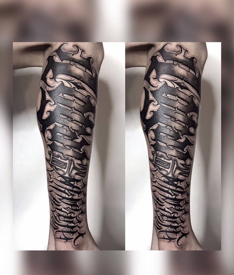 UVB2纹身图片_腿部花体字纹身图案