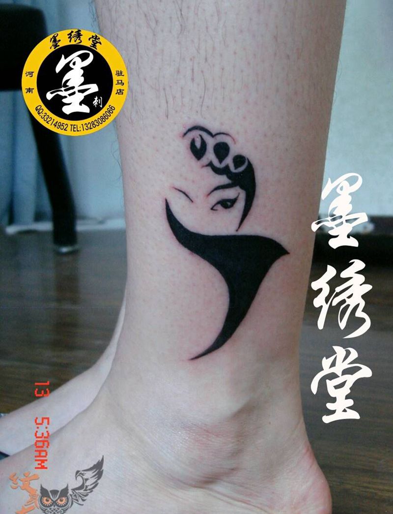 图腾脸谱纹身图片