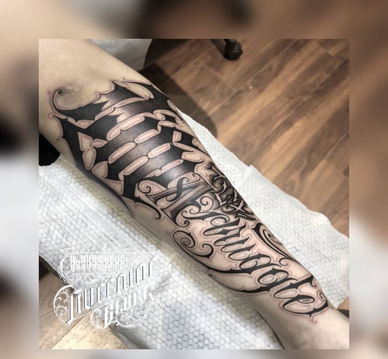 UVB2纹身图片_手臂花体字纹身图案