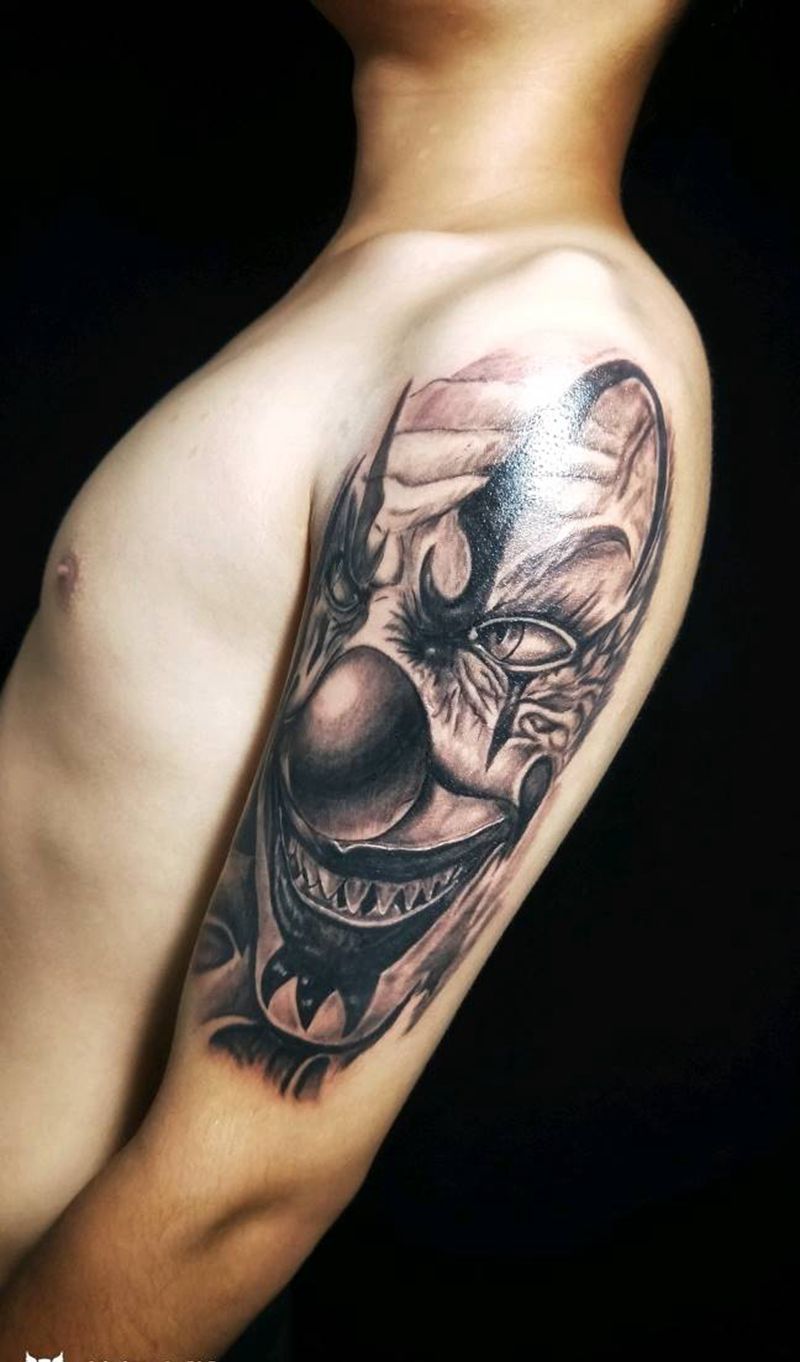 小丑纹身图片_手臂欧美写实纹身图案