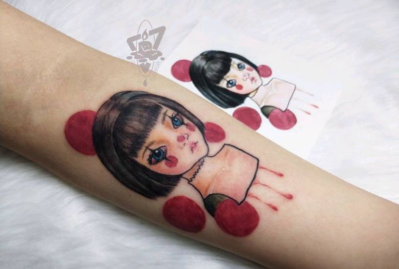 小丑娃娃纹身图片_手臂纹身图案