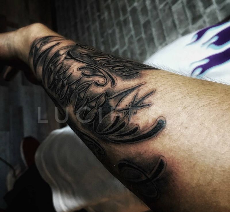 fatal wound纹身图片_成品手臂欧美字符纹身图案