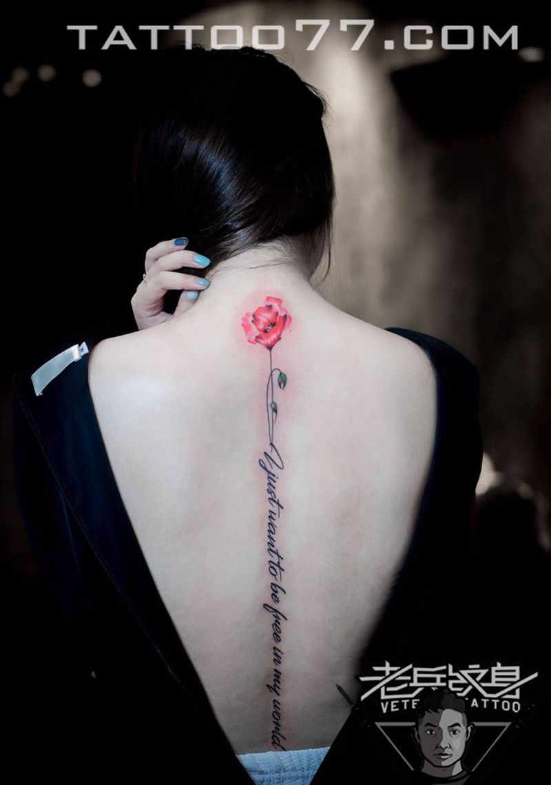 脊椎花卉字母纹身作品纹身图片_成品背部清新植物纹身图案