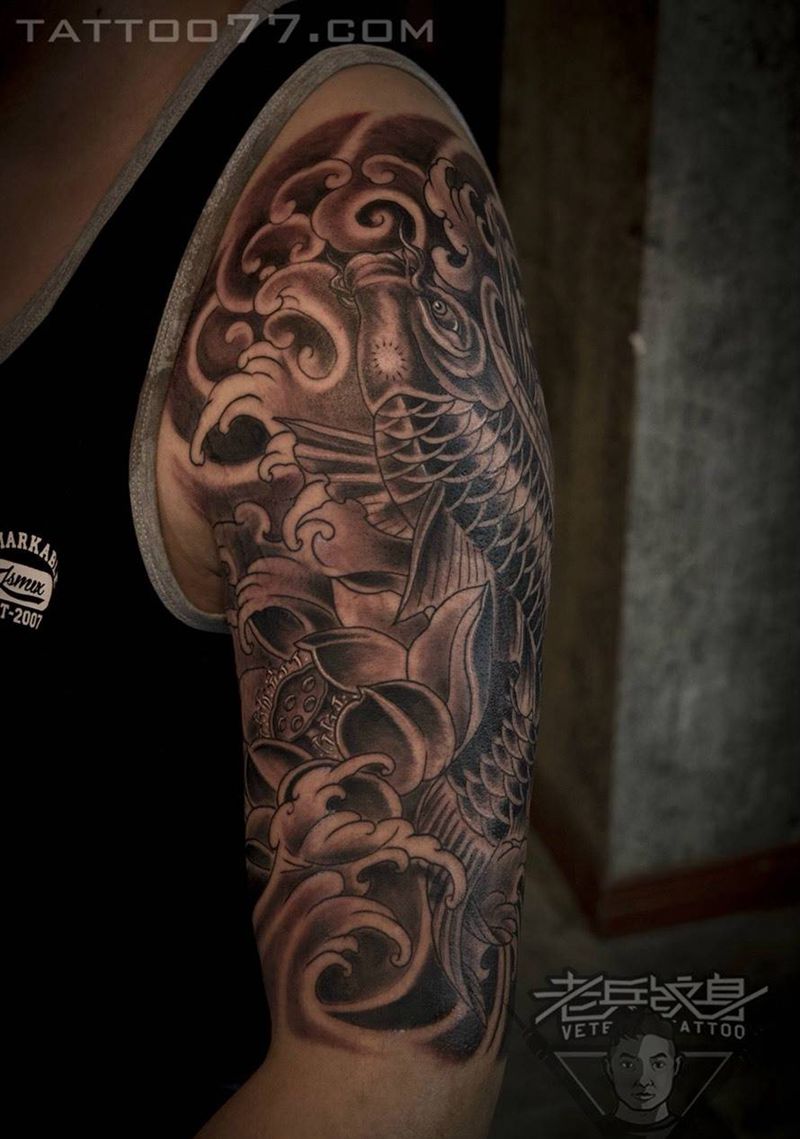 大臂鲤鱼纹身作品纹身图片_成品手臂传统动物纹身图案