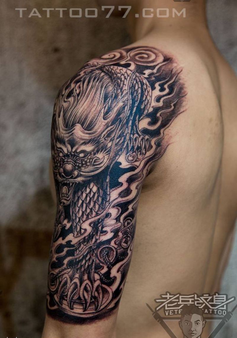 大臂麒麟纹身作品纹身图片_成品手臂传统鬼神纹身图案