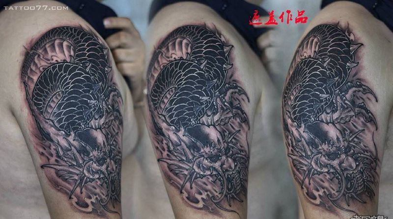 大臂龙纹身，遮盖作品纹身图片_成品手臂传统纹身图案