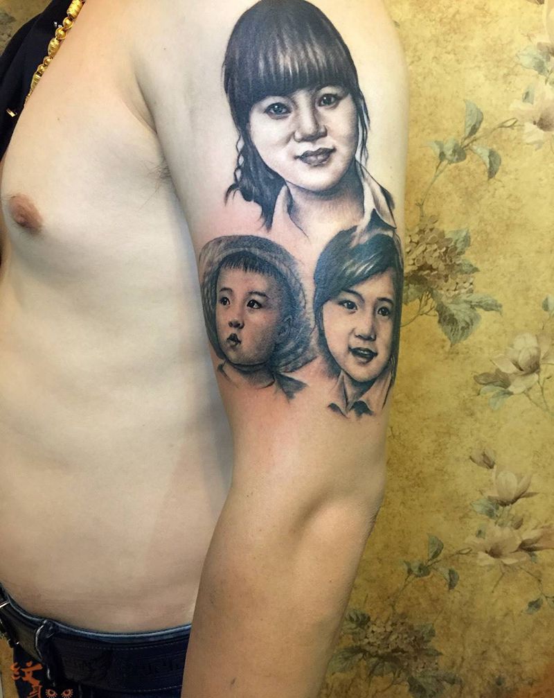 家庭纹身图片_手臂肖像纹身图案