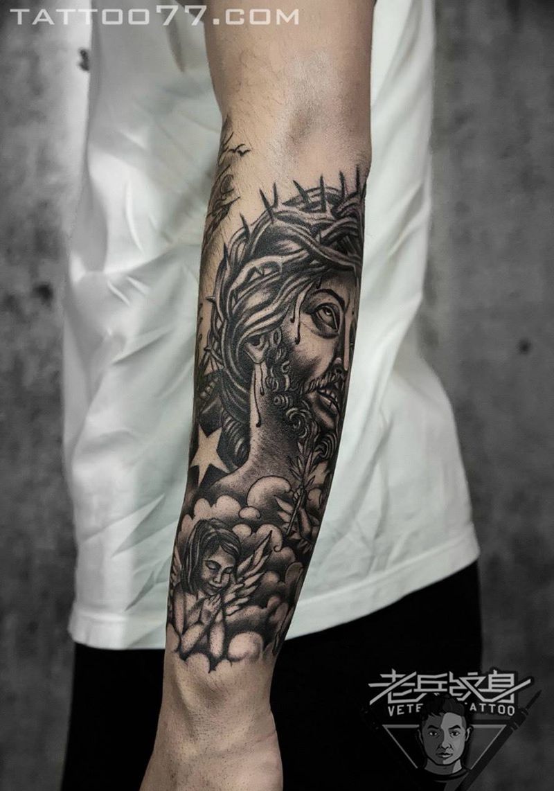 小花臂耶稣纹身作品纹身图片_成品手臂欧美人物宗教纹身图案