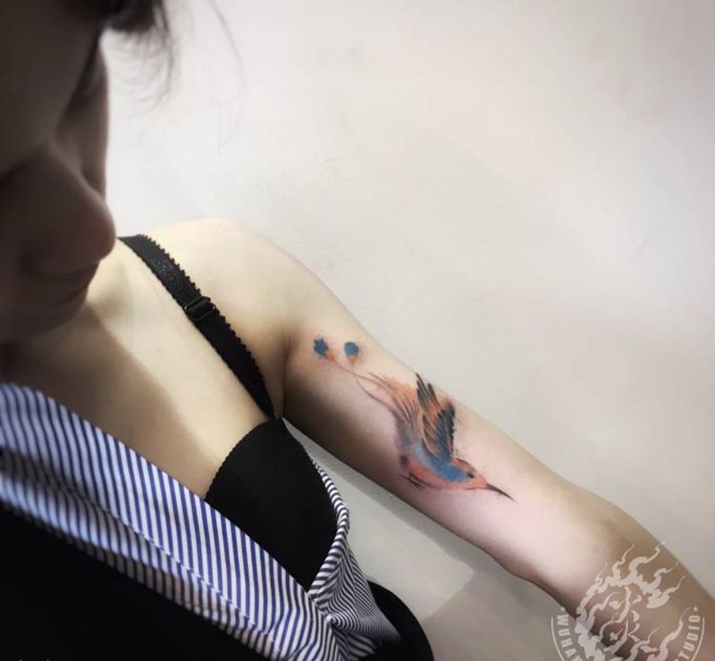 墨鸟纹身图片_手臂水墨纹身图案