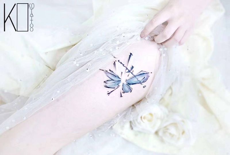 蝴蝶纹身图片_腿部水彩水墨一人一图定制蝴蝶纹身图案