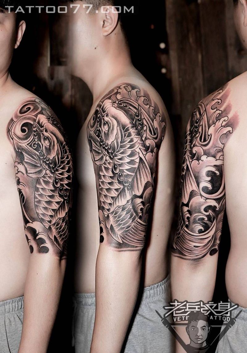 大臂鲤鱼纹身作品纹身图片_成品手臂传统动物纹身图案