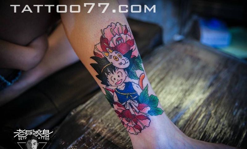 小腿卡通人物牡丹纹身作品纹身图片