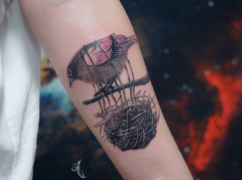 鸟巢纹身图片_手臂点刺纹身图案