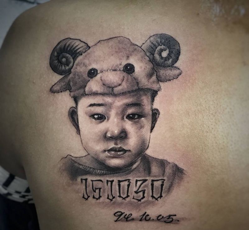 小肖像一枚纹身图片_成品肩部欧美背部肖像写实人物武汉纹艺刺刻纹身图案