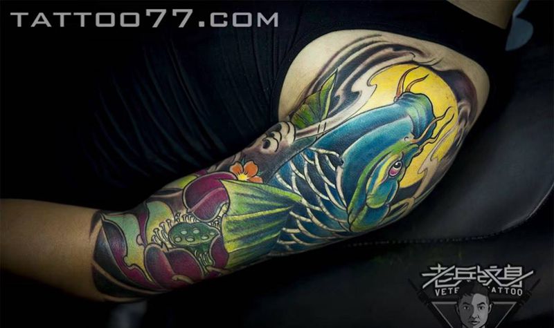 大臂鲤鱼纹身纹身图片_成品手臂传统动物纹身图案