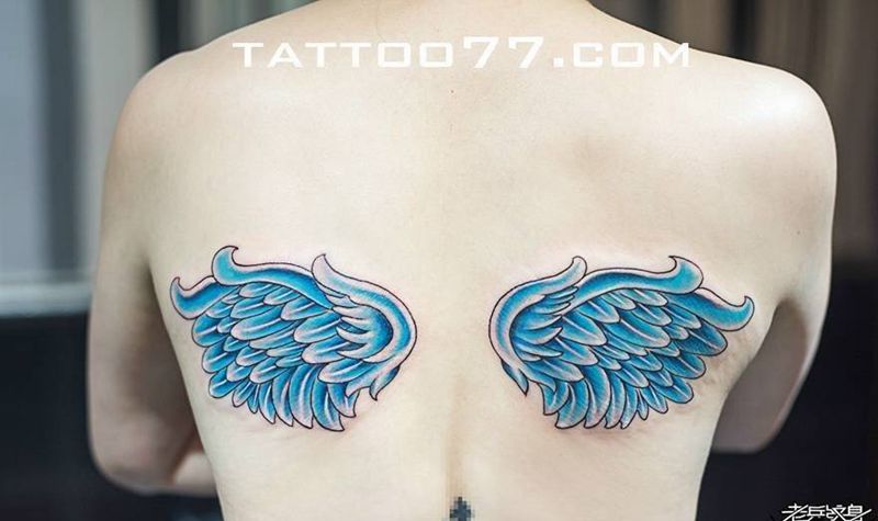 后背牡丹翅膀纹身图片_背部欧美传统植物动物纹身图案