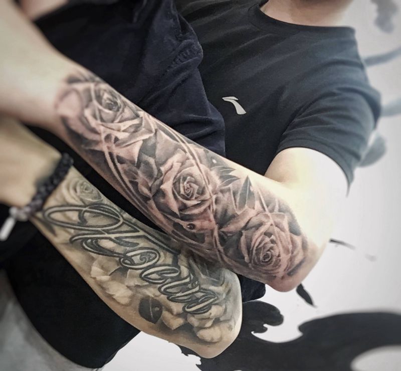 玫瑰纹身图片_手臂欧美写实纹身图案