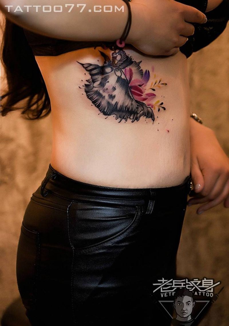 侧腰海螺纹身作品纹身图片_成品腰部清新植物纹身图案