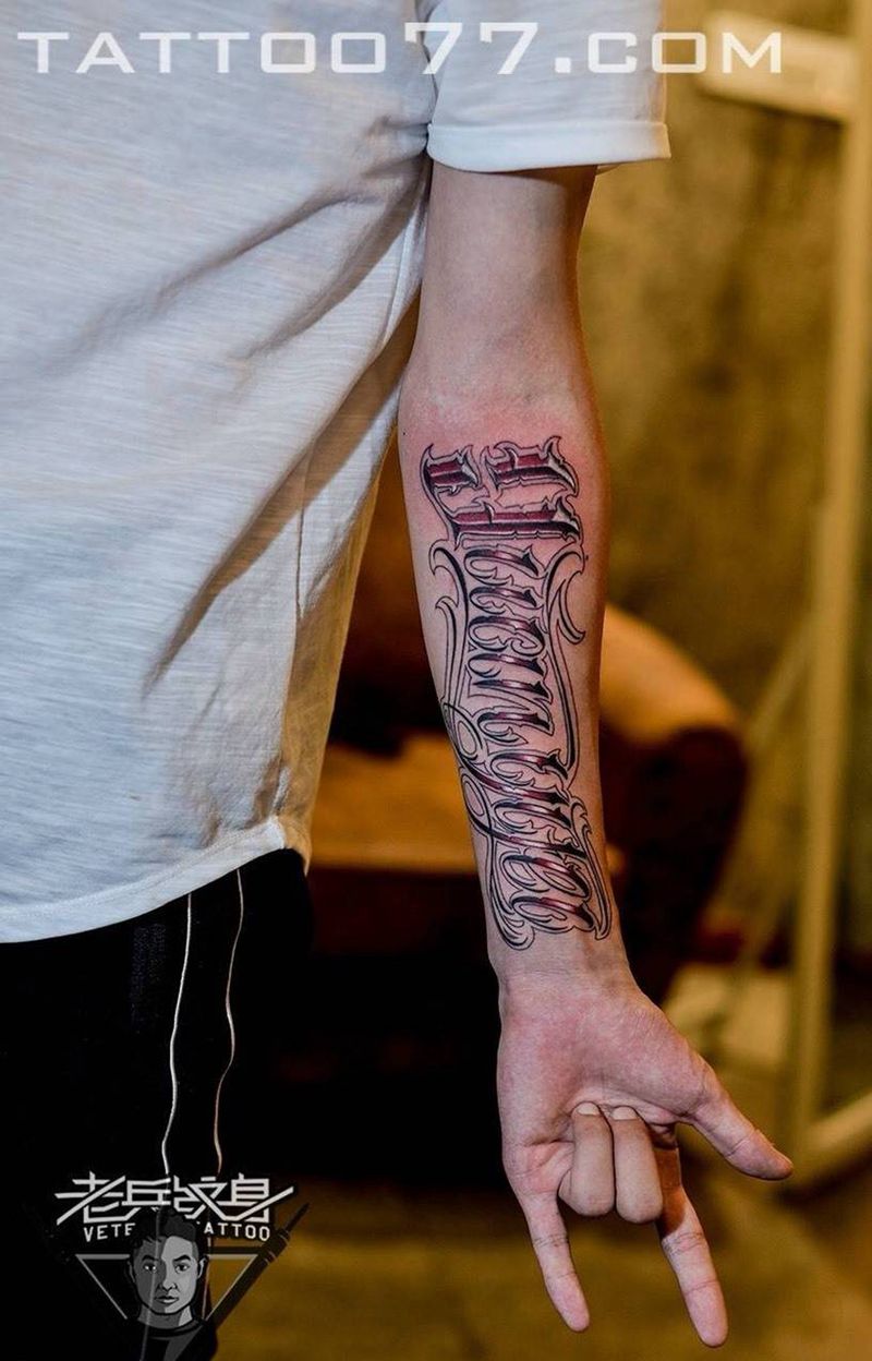 手部奇卡诺花体字纹身作品纹身图片