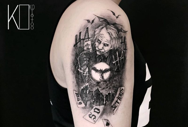 小丑《蝙蝠侠》纹身图片_手臂点刺欧美写实小丑暗黑蝙蝠侠纹身图案
