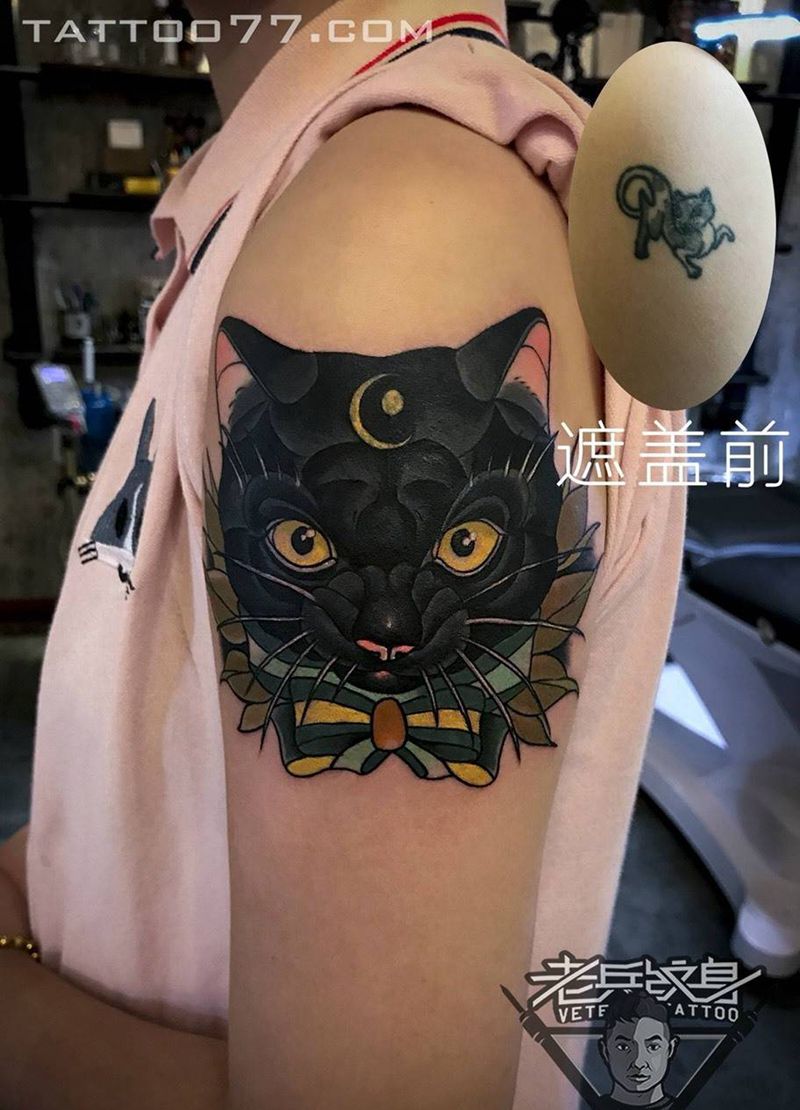 大臂猫咪纹身作品纹身图片_成品手臂欧美动物纹身图案